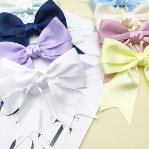 โบว์ริบบิ้นขนาดเล็กงานตามสั่ง50ชิ้นราคาโรงงานผลิตจากผ้าซาตินโพลีเอสเตอร์สำหรับห่อของขวัญประจำวัน - Product Image 3