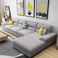 Canapé sectionnel de loisirs 7 places beige au design moderne de Foshan, grande taille avec appuie-tête réglable, tissu technologique pour salon