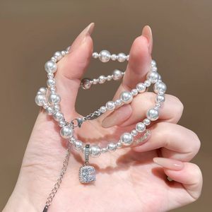 สร้อยคอไข่มุกเทียมพร้อมจี้ประดับเพชรคิวบิกเซอร์โคเนีย สร้อยลูกปัดกลมสีขาวสำหรับผู้หญิง เครื่องประดับสำหรับสวมใส่ทุกวัน - Product Image 4