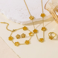 Ensemble de bijoux en acier inoxydable classique plaqué or 18 carats, collier, bracelet, boucles d'oreilles, bagues, motif trèfle à cinq feuilles, pour femme, bijoux de fête