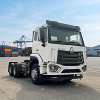 Тягач Howo NX 6x4 б/у, Евро-2, лево-/праворульный, 371/380 л.с., дизель, с камерой заднего вида, для перевозки контейнеров до 30 тонн