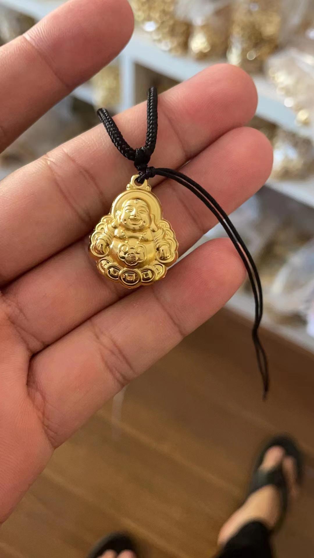 Copper coin Buddha (including rope)