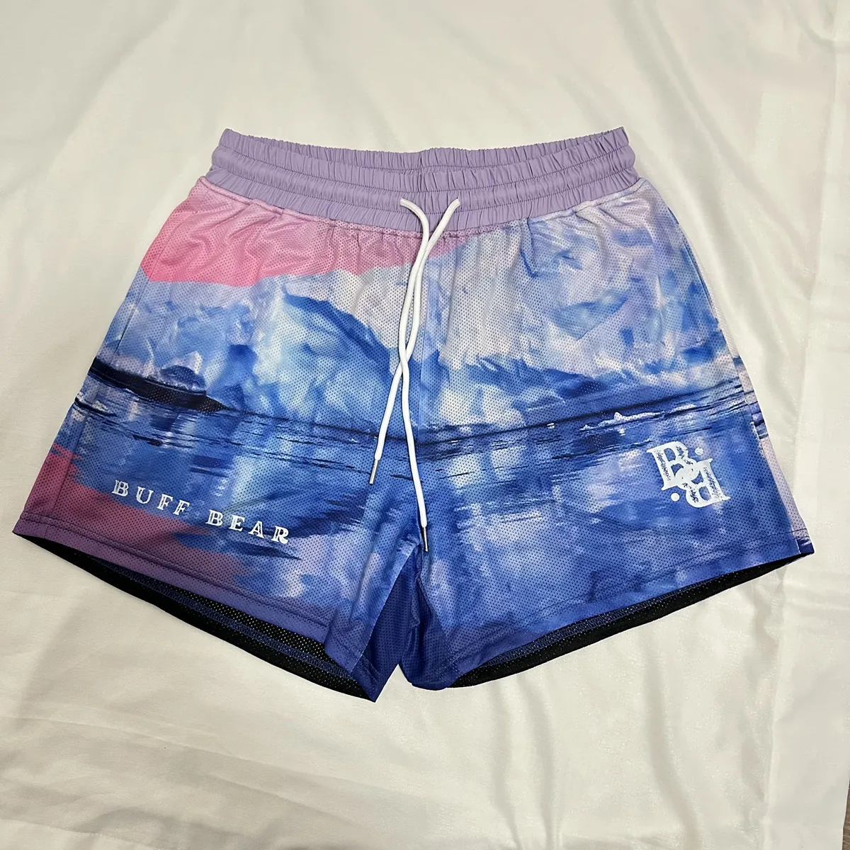 2024 nouveau style personnalisé pleine impression sublimation maille hommes vêtements de sport shorts avec poches