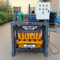 Machine automatique LONTA QMJ4-40 pour la fabrication de blocs de pavé creux emboîtables 4, 5, 6, 8, en cendres volantes, ciment et béton
