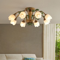 Lustre moderne en cristal de style européen Lampe florale de luxe pour salle à manger Villa Plafond rétro LED dans le salon Chambre Base en fer
