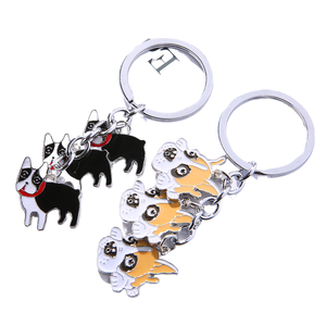 Buena calidad Changzhi venta al por mayor mascota perro estilo mochila llavero accesorios CADENA DE Metal colgante regalo de vacaciones - Product Image 1