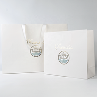 Sacs en papier de luxe élégants pour le shopping, sacs cadeaux en papier avec votre propre logo