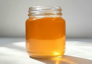 Miel de naranja natural dorada Calidad orgánica pura Aroma rico Cuerpo suave Ideal para cocinar alimentos diarios y comercio de exportación - Product Image 6