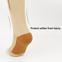 Vente en gros Chaussettes athlétiques unisexes personnalisées Chaussettes longues de haute qualité avec fermeture éclair et compression au genou quantité minimale de commande bas Soutien à la mode