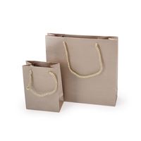 Sac de papier réutilisé écologique de bijoux avec la poignée molle de logo pour l'emballage et les événements de cadeau de boutique