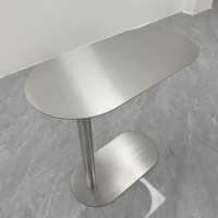 Table basse ovale simple et moderne en acier inoxydable avec base en fer pour hôtels et canapés de luxe pour meubles de maison