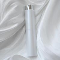 Atomiseur de parfum portable rechargeable OEM personnalisé 5ml 8ml 10ml 20ml à mécanisme rotatif, corps en plastique ABS, boîte en carton