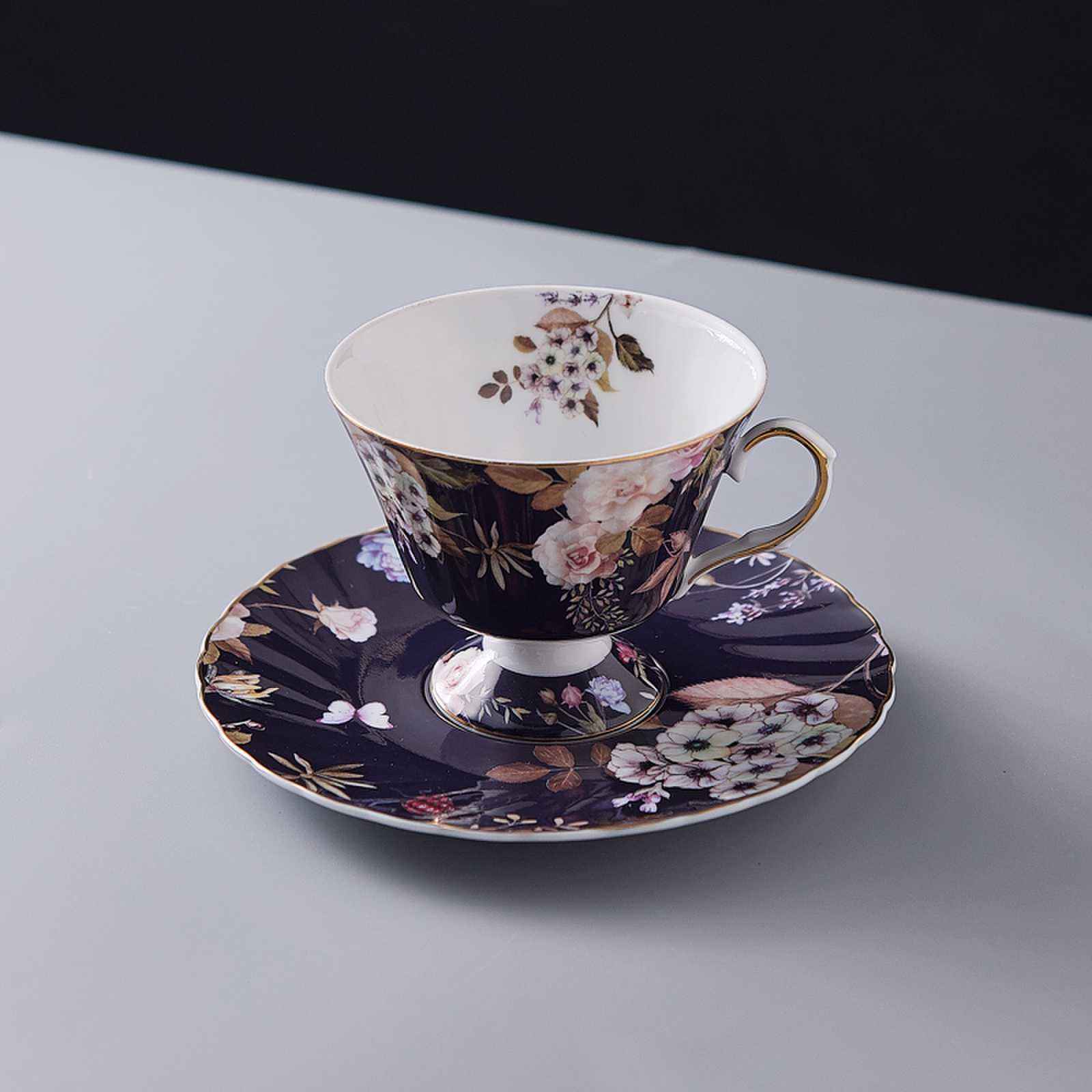 Blue bottom D cup and saucer