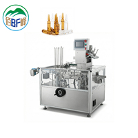 Cartonneuse horizontale intermittente pour flacons, 60-100 boîtes/min, pour plateaux multi-paquets