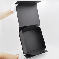 Boîte d'emballage pliable magnétique en papier rigide noir de luxe personnalisée avec ruban, logo personnalisé en feuille d'or