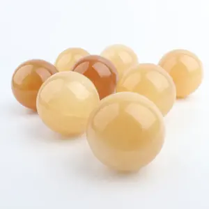 Natural polished crystal ball whole sale yellow calcite for feng shui decoration crystal balls