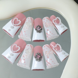 Precio de fábrica al por mayor, uñas postizas de lujo de acrílico con diseño de estrella y mariposa, de cobertura completa, hechas a mano, con forma de pico de pato. - Product Image 1