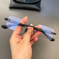 Lunettes optiques rectangulaires rétro de luxe pour hommes, anti-lumière bleue, nouvelle arrivée, vente en gros, monture sans bord en métal
