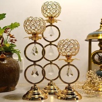 Candelabro de Hierro Forjado Retro Chapado en Oro Hecho a Mano con Diseño de Bola de Cristal para Decoración de Mesa de Boda