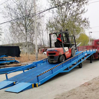 Vente flash Rampe de conteneur réglable Niveleur de quai mobile avec rampe hydraulique en acier haute résistance pour entrepôt/chariot élévateur