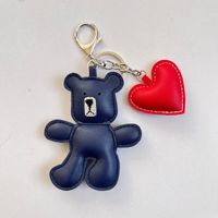 Porte-clés en PU en forme d'ours, mini breloque de sac, cadeau souvenir, pendentif cœur