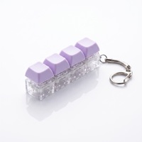 Porte-clés Fidget Macaron 4 touches avec capuchon lumineux, jouet à presser au bout des doigts, vente en gros, personnalisable