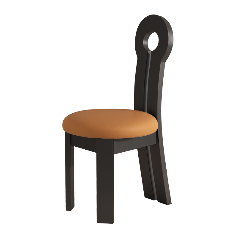 Fauteuil clé en cuir orange avec cadre noir