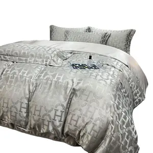 Hot Selling Polyester Fibre Bedding Set Light Luxury Satin Jacquard Conjunto de cama de luxo lençóis cama capa