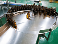 Machine de remplissage automatique haute performance pour liquides, avec suivi des flacons et bouteilles en plastique