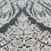Nouveau design, tissu en dentelle de tulle lourdement perlé, dentelle brodée blanche de haute qualité pour robe de mariée