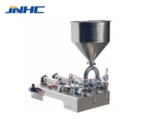 Machine de remplissage automatique commerciale à double tête de 50 à 500 ml pour boissons, miel, beurre de cacahuète, crème, shampoing, à entraînement pneumatique