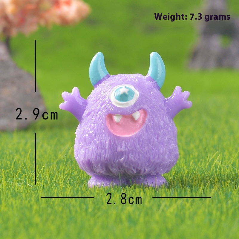 Purple two-horned monster