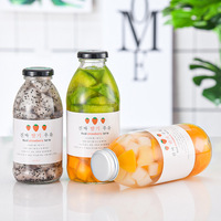 En gros 300ml 350ml 500ml 16oz clair vide ronde en verre boisson de jus de fruits potable bouteilles avec bouchon à vis en métal