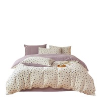 Parure de lit quatre pièces en fil froissé ultra-doux de qualité maternelle et infantile, comprenant une housse de couette, un drap plat et un drap-housse pour un sommeil aérien et agréable