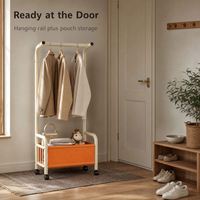 Porte-vêtements sur roulettes autoportant à tube rond épais grande capacité avec rail de suspension pour chambre familiale et placard
