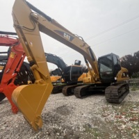 Excavatrice Caterpillar 320CL d'occasion à faible nombre d'heures de fonctionnement, 20 tonnes, avec godet robuste pour travaux miniers