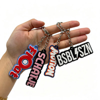 Porte-clés personnalisés en PVC découpé 2D avec logo promotionnel en caoutchouc, idéal pour la promotion de marque