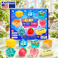 Ensemble de jouets moelleux KAITONG assortis avec des formes de nourriture et des cubes transparents dans une boîte colorée pour les boutiques de cadeaux, jouets moelleux à presser