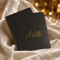 Enveloppes personnalisées en carton noir pour une marque de mode avec logo en feuille d'or