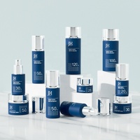 Pot de crème personnalisé de marque privée contenant cosmétique vide en verre blanc bouteille de lotion de soin pour le visage ensemble de soins de la peau emballage