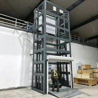 Plateforme élévatrice verticale hydraulique à rail de guidage sécurisé, monte-charge fixe pour le transport de matériaux