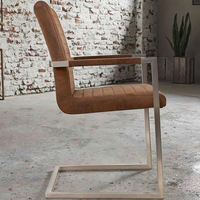 Vente en gros Loft Chaise en porte-à-faux avec accoudoirs rembourrés et cadre chromé Chaise de salle à manger Chaises de salle à manger marron vintage