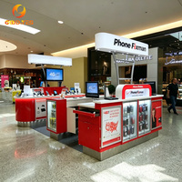 Kiosque de téléphonie mobile pour centre commercial, comptoir incurvé rouge et blanc avec affichage numérique pour la réparation et la vente au détail