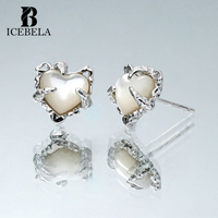 Boucles d'oreilles clous en argent sterling 925 pour filles, design coréen élégant et raffiné, en forme de cœur avec pierre coquillage, par un créateur de bijoux fins