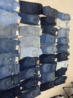 Jeans Denim sobek bekas kualitas tinggi desain kurus untuk pria wanita untuk musim dingin penggunaan harian obral stok tinggi