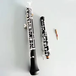 <span class=keywords><strong>Instrument</strong></span> <span class=keywords><strong>hautbois</strong></span> en bakélite 17 touches plaqué argent à très bon <span class=keywords><strong>prix</strong></span> - Product Image 1