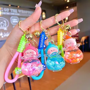 2013 New Wholesale Gifts Creative Cute Quicksand Liquid Filled Bottle Keychain Kawaii Arylic Floating Oil Pig Keychain