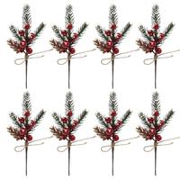 Décorations de branches de Noël comprenant des flocons de neige, des aiguilles de pin, des branches de fleurs et des plantes artificielles avec des baies rouges