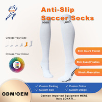 Chaussettes de sport de compression haut de gamme personnalisées, unies, en silicone à pois antidérapants, avec semelle semi-éponge, pour le football et la course à pied