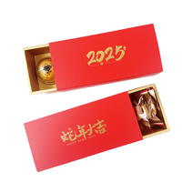 Boîte cadeau du Nouvel An 2025 en carton ondulé croustillant motif flocon de neige nougat serpent avec design fleur de pêcher, en matériaux recyclés, boîtes à fentes